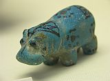 British Museum Top 20 15-2 Blue Egyptian Hippo Close Up 15. Blue Egyptian Hippo - 1800 BC. Here is a close up of the very small blue hippopotamus sculpture, decorated with papyrus flowers and birds.